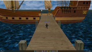 player on gangplank leading to wooden tallship