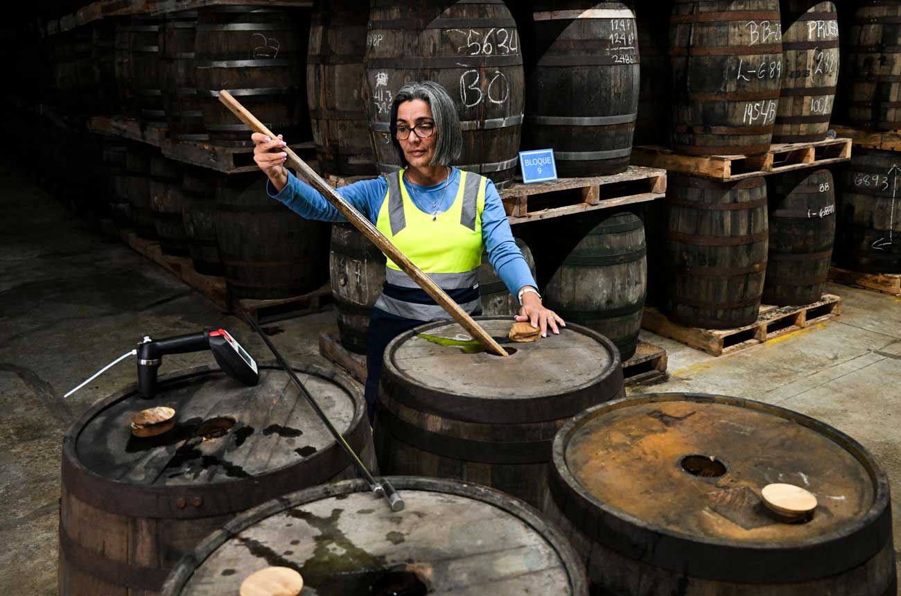 Checking barrels at Havana Club's San Jose de las Lajas rum distillery in Cuba
