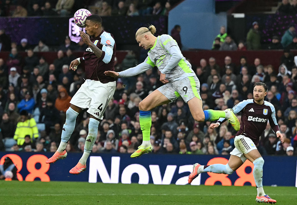 Ezri Konsa beats Erling Haaland to a header
