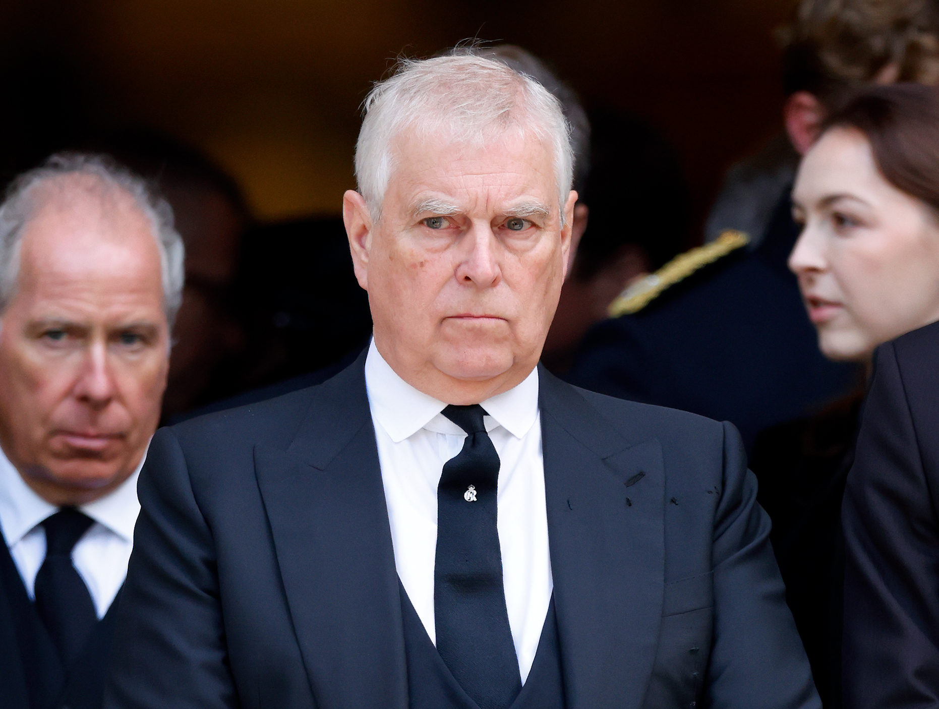 Ex Prince Andrew wearing a dark suit and tie