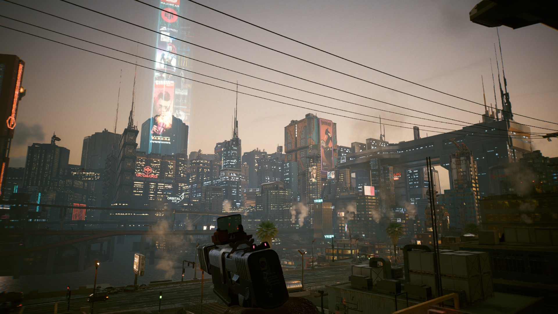 Cyberpunk 2077 Switch 2 gameplay showing the player holding a gun and looking out at the skyline of Night City