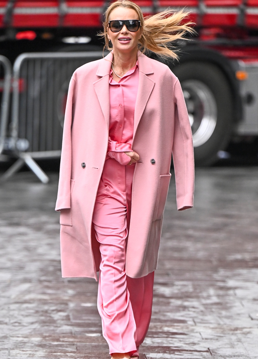 Amanda Holden wearing pink coat