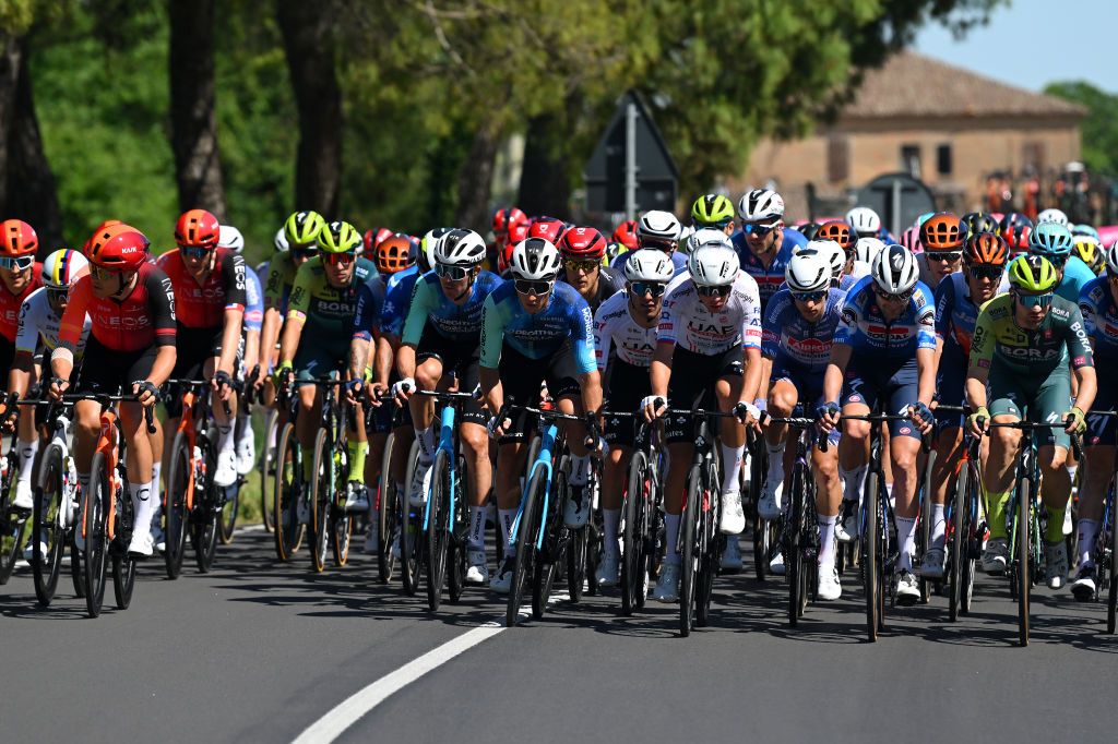 CENTO ITALY MAY 17 LR Ben OConnor of Australia Damien Touze of France and Decathlon AG2R La Mondiale Team Domen Novak of Slovenia and UAE Team Emirates Pieter Serry of Belgium and Team Soudal QuickStep and Maximilian Schachmann of Germany and Team BORA hansgrohe lead the peloton during the 107th Giro dItalia 2024 Stage 13 a 179km stage from Riccione to Cento UCIWT on May 17 2024 in Cento Italy Photo by Dario BelingheriGetty Images