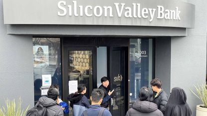 people gathered outside of Silicon Valley Bank entrance