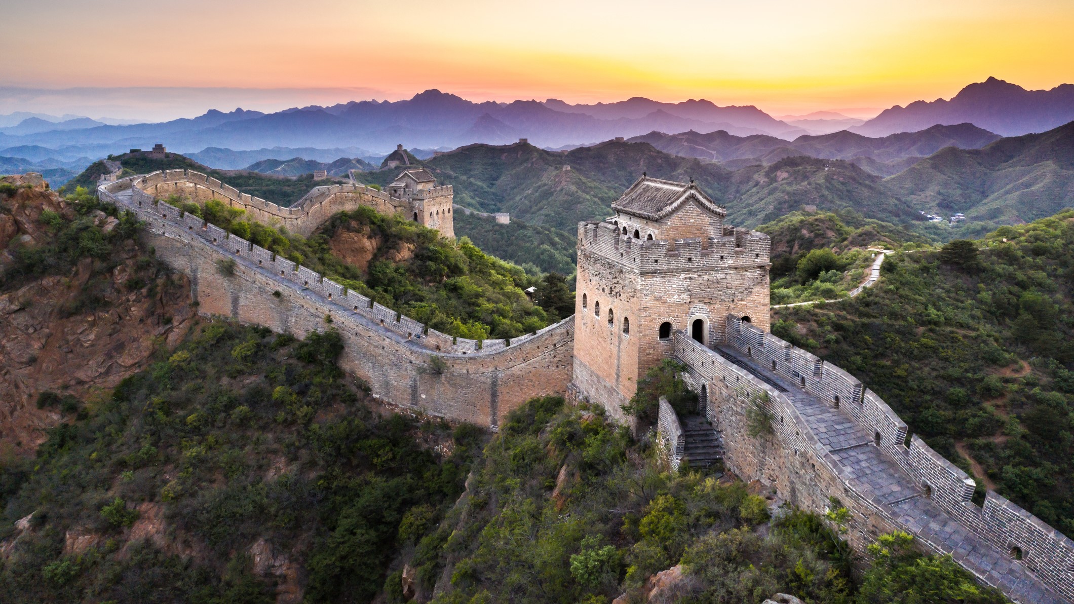 The Great Wall of China snaking through the rugged landscape.