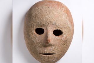 This stone mask was found in a field in the West Bank.