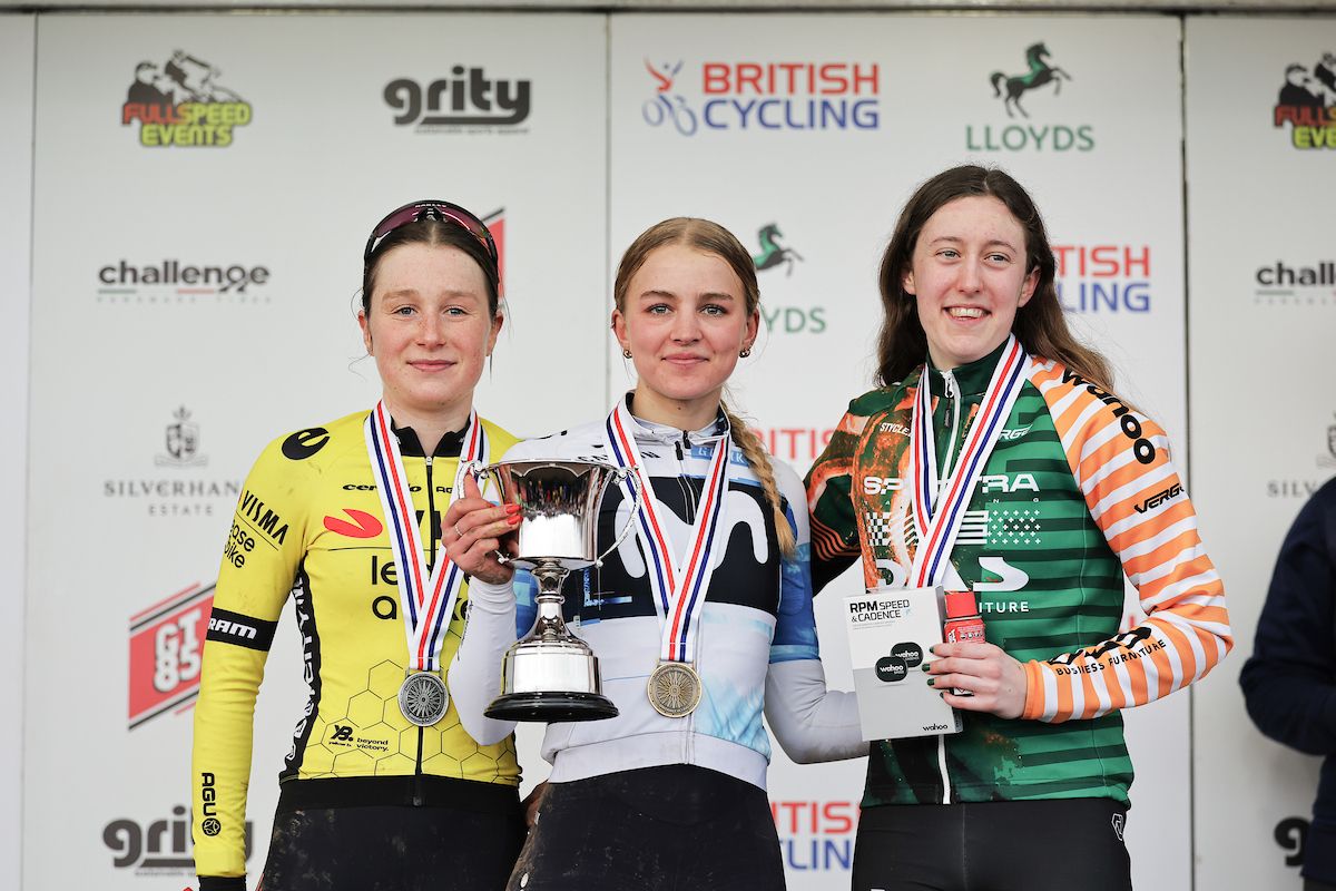 Picture by Alex Whitehead/SWpix.com - 12/01/2024 - Cycling - British Cycling Lloyds Cyclo-cross National Championships 2025 - Cyclopark, Gravesend, Kent - Elite Female - U23 Female Podium - Cat Ferguson (Movistar Team) on the podium receiving the Gold Medal to become U23 National Champion, Imogen Wolff (TEAM VISMA - LEASE A BIKE) receiving the Silver Medal and Hope Inglis (Spectra Racing p/b DAS) receiving the Bronze Medal