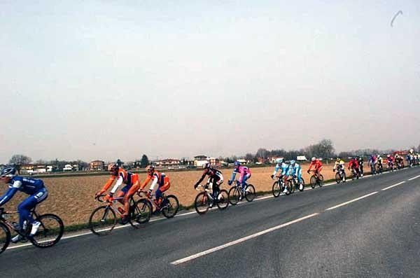 The peloton rolls through on their way to the glamour of San Remo