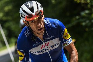 Philippe Gilbert (Quick-Step Floors) gets back on his bike after a crash