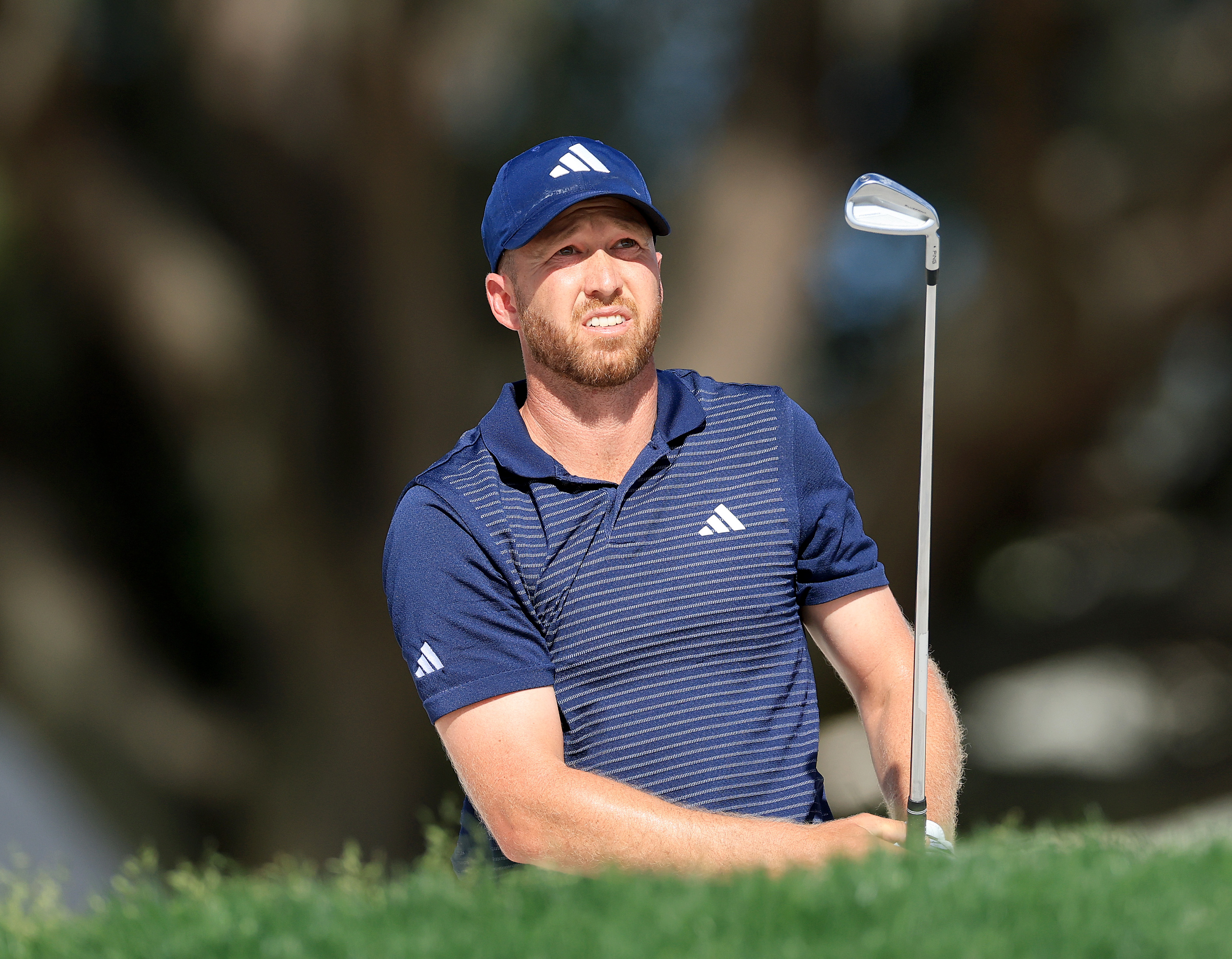 Daniel Berger hits an iron shot