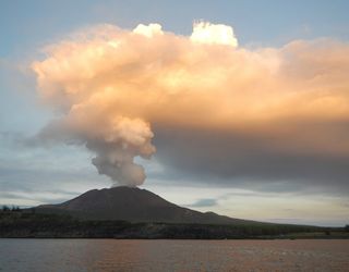 A volcano on Pagan, one of the Mariana Islands. Volcanic activity near subduction zones around the world is fueled in part by water in the mantle.
