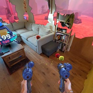 Two hands holding VR guns in room