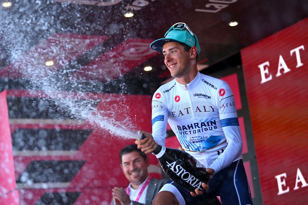 DESENZANO DEL GARDA ITALY MAY 18 Antonio Tiberi of Italy and Team Bahrain Victorious celebrates at podium as White best young jersey winner during the 107th Giro dItalia 2024 Stage 14 a 312km individual time trial stage from Castiglione delle Stiviere to Desenzano del Garda UCIWT on May 18 2024 in Desenzano del Garda Italy Photo by Dario BelingheriGetty Images