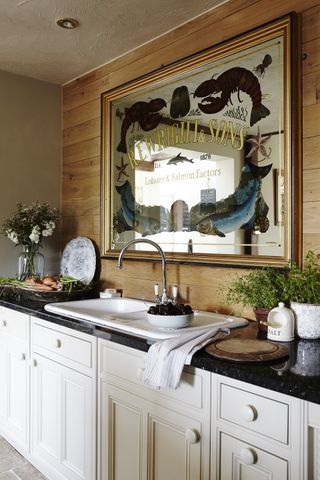 Kitchen in the Bunyans' Grade II listed 16th century former coaching inn from Period Living magazine