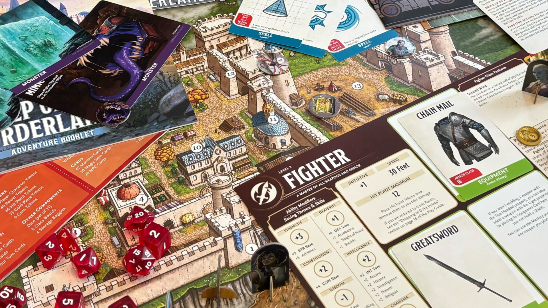 Cards, a map, dice, and tokens for the D&amp;amp;D Starter Set: Heroes of the Borderlands laid out