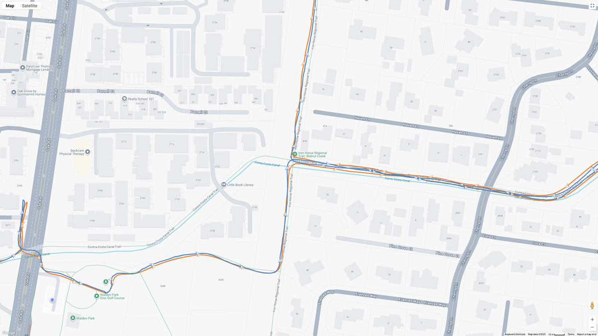 A Google Maps map view showing GPS location data for a workout, with the COROS APEX 4 (orange line) and Garmin Forerunner 970 (blue line) showing how their dual-band GPS tracking compares.