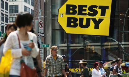 People walk by a Best Buy in New York City