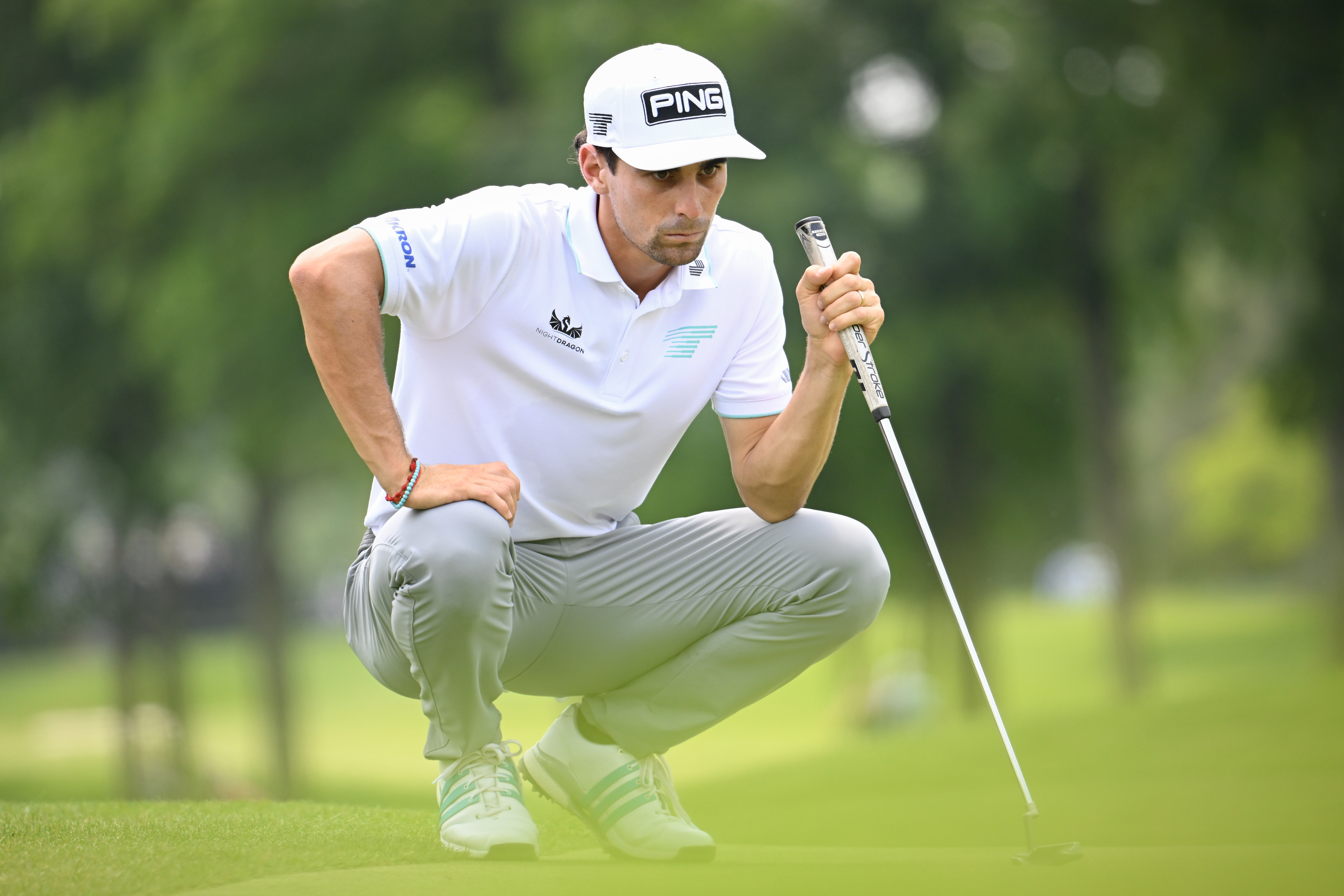 Joaquin Niemann lines up a putt