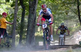 Todd Wells (Specialized Racing) takes the lead heading in to the last lap