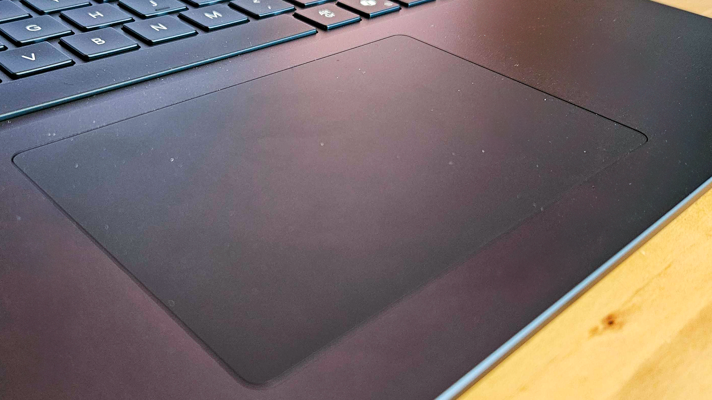 Microsoft Surface laptop on table (touchpad)