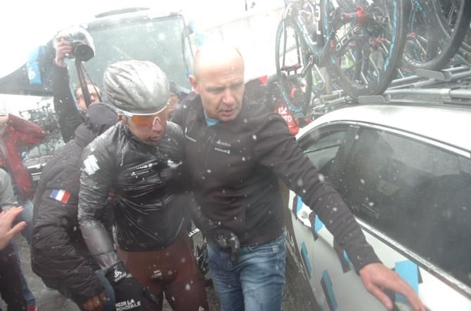 Manuel Belletti is helped to the team car