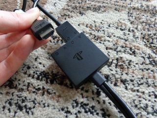 Plug the HDMI cable from your TV into the connector box.