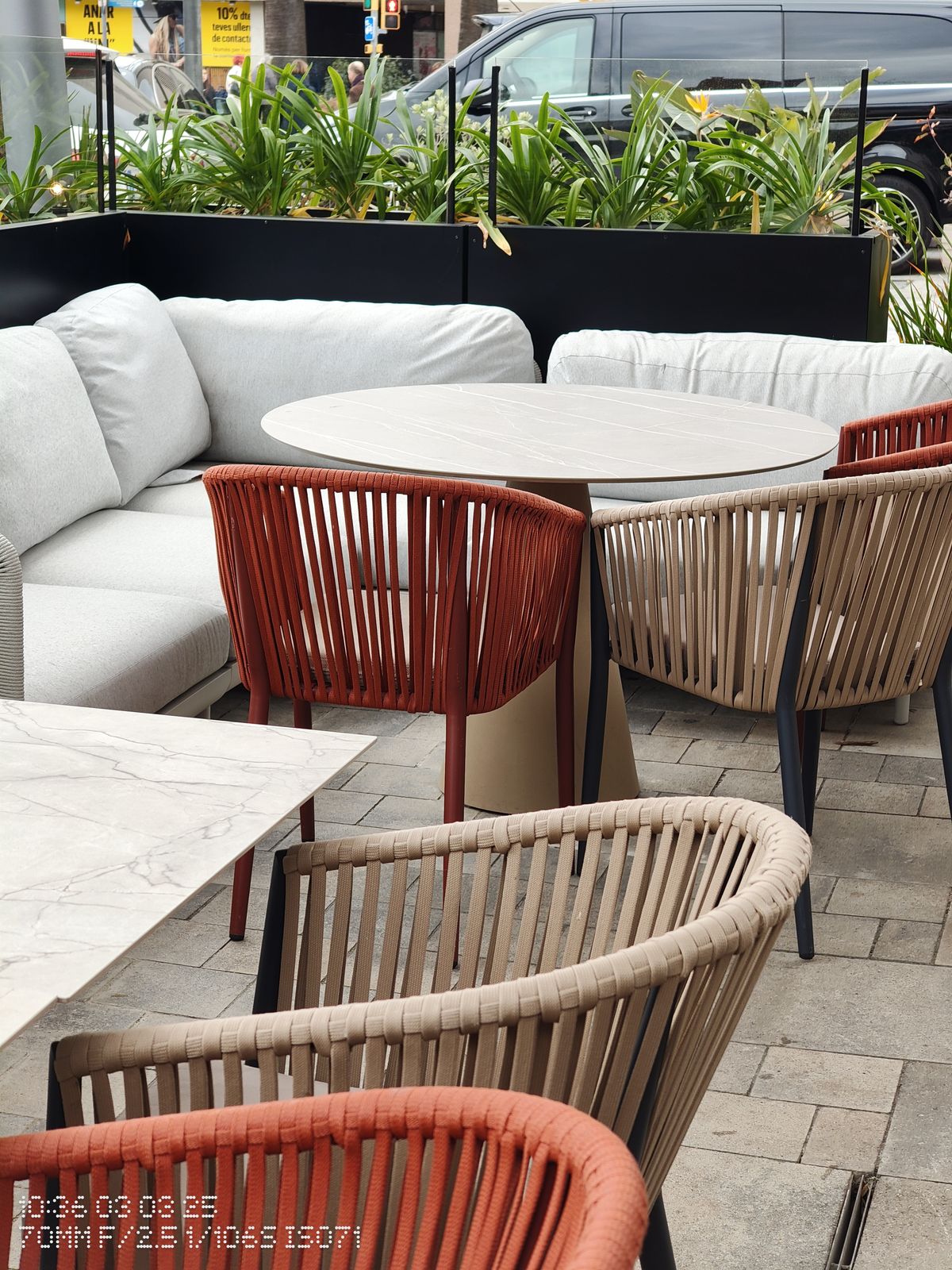 Chairs around tables in a cafe