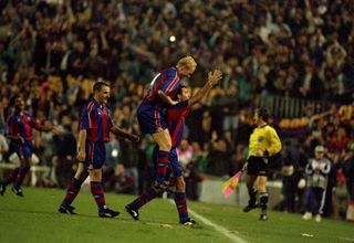 Barcelona players celebrate a goal against Manchester United in the Champions League in 1994.