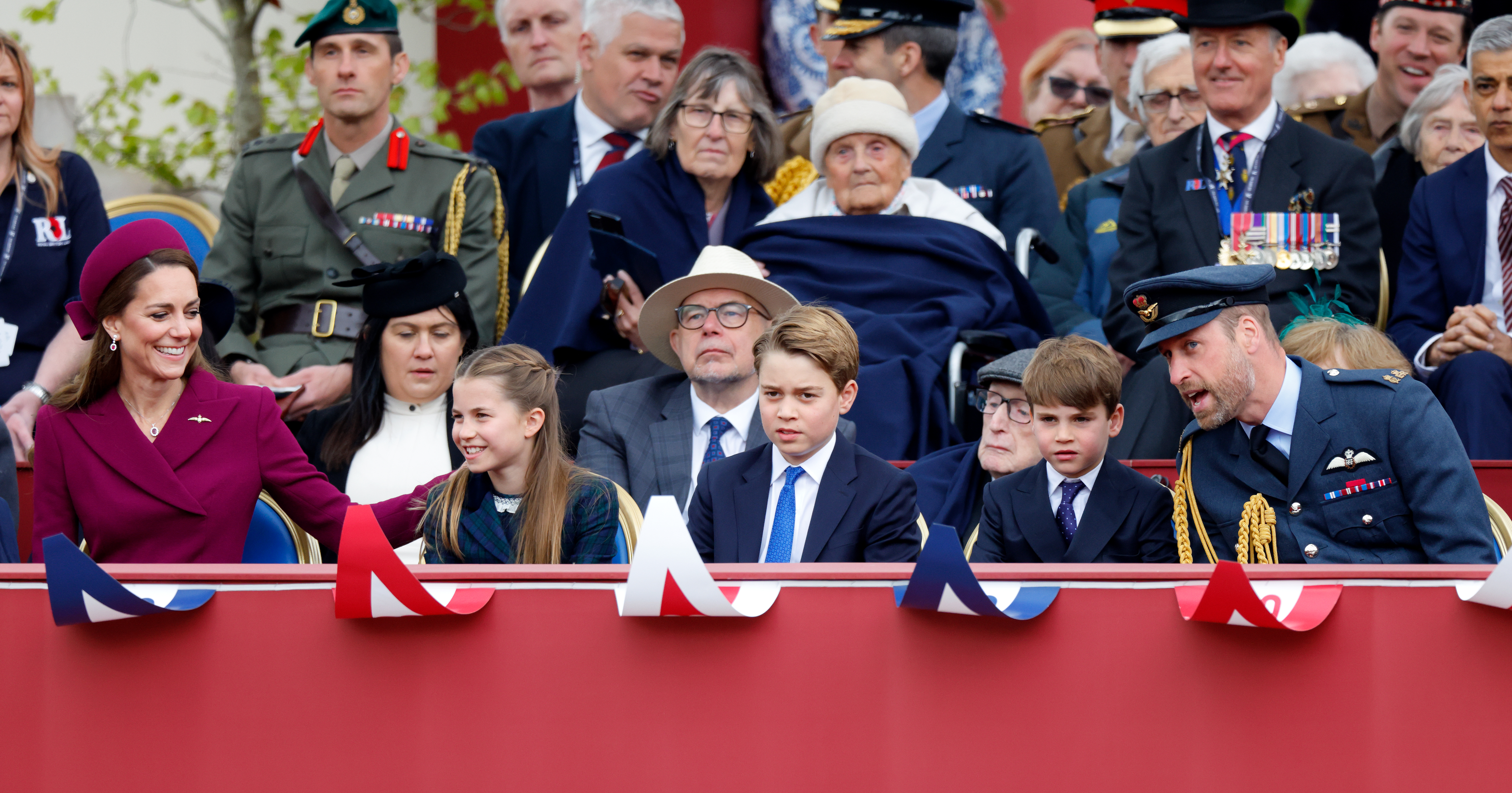 Princess Kate, Princess Charlotte, Prince George, Prince Louis and Prince William at a VE Day parade