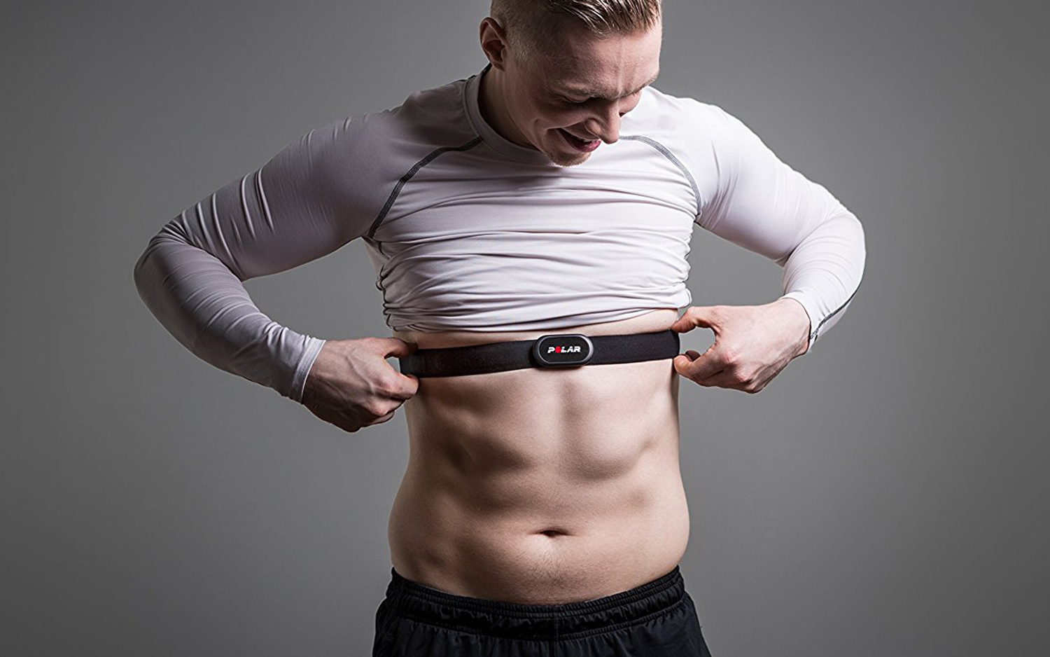 Man wearing Polar chest strap heart rate monitor