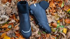 Shimano MW502 winter boots pictured on some autumn leaves