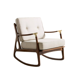 modern rocking chair with brass accents
