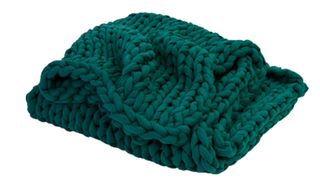 Best weighted blankets: The Bearaby Organic Cotton Knitted Weighted Blanket shown in Forest Green