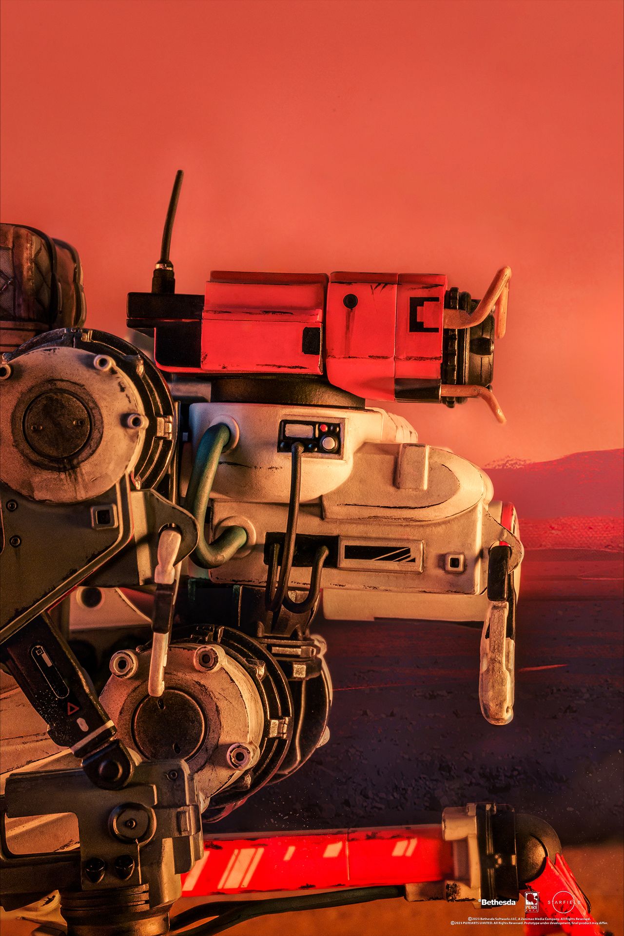 Vasco action figure posed on a sandy planet background
