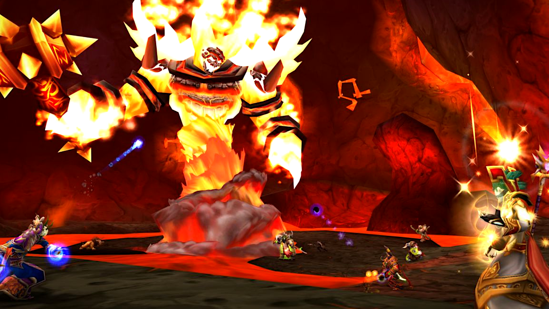 Ragnaros the fire lord, a towering elemental of flame, does battle with players in World of Warcraft Classic.