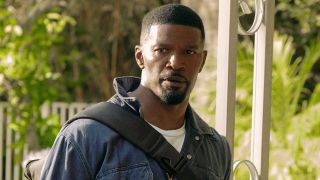 Jamie Foxx looking to the left in Day Shift.
