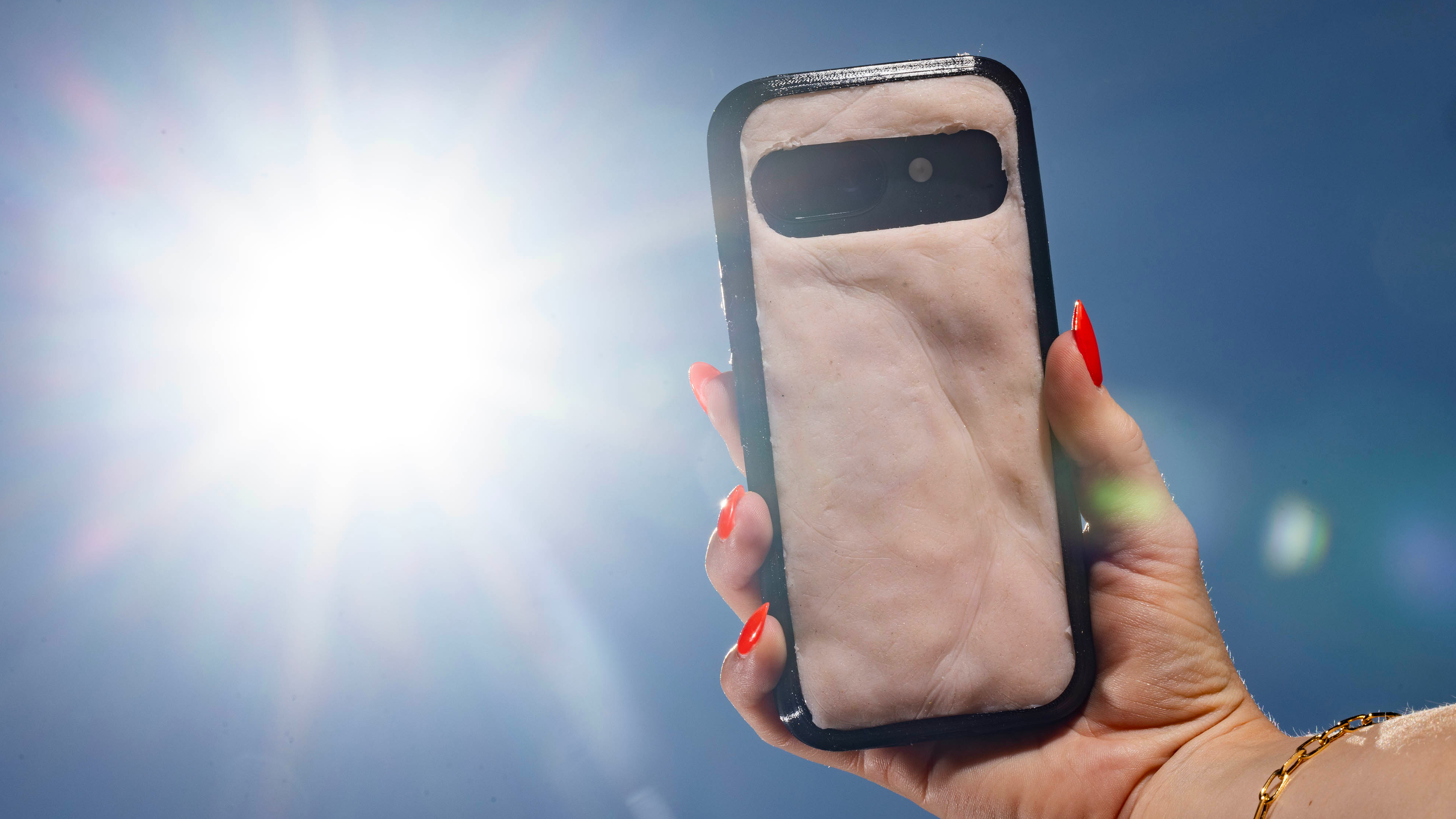 The O2 Skincase being held in the hand