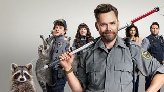 Frank (played by Joel McHale, foreground) works for the Seattle animal control department with a team of dysfunctional colleagues