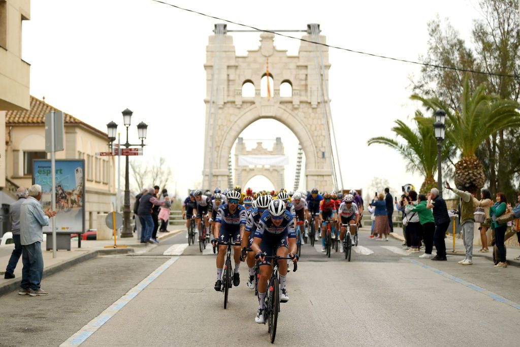 LO PORT SPAIN MARCH 24 A general view of Pieter Serry of Belgium and Team Soudal QuickStep leads the peloton passing through the Penjant bridge in Amposta during the 102nd Volta Ciclista a Catalunya 2023 Stage 5 a 1766km stage from Tortosa to Lo Port Mirador del Portell 1033m UCIWT on March 24 2023 in Lo Port Spain Photo by David RamosGetty Images