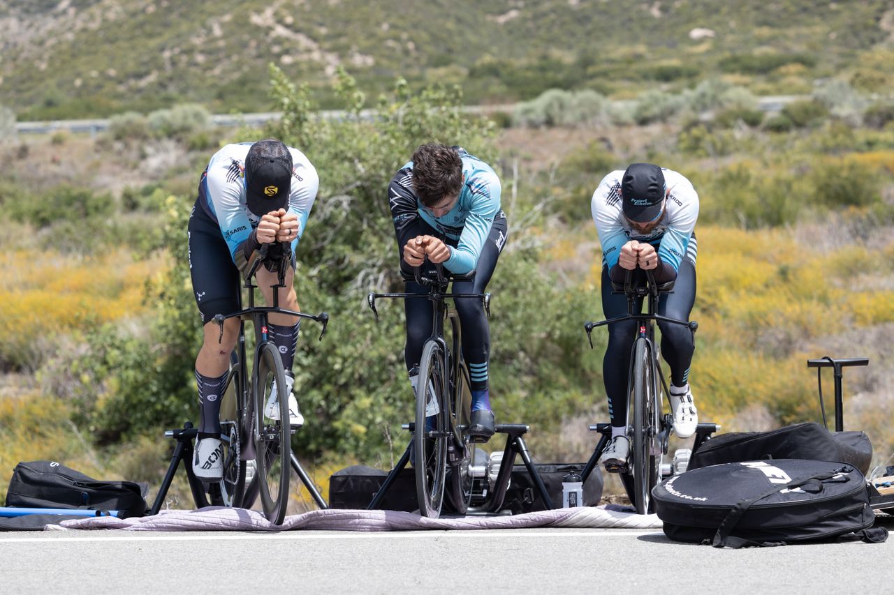 (left to right) Dr. Stephen Vogel, Hugo Scala, Jr, and Matt Zimmer of Project Echelon racing practice getting into a good aero position before the TT.