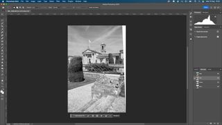 A Photoshop screenshot of a stately home and garden in black and white