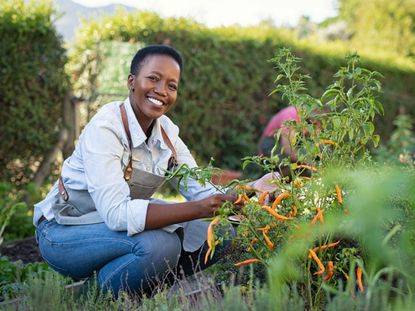 Person Smiling In The Garden