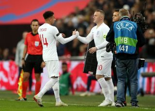 Rooney (right) made his 120th England appearance as a substitute against the United States in November 2018 (Nick Potts/PA).