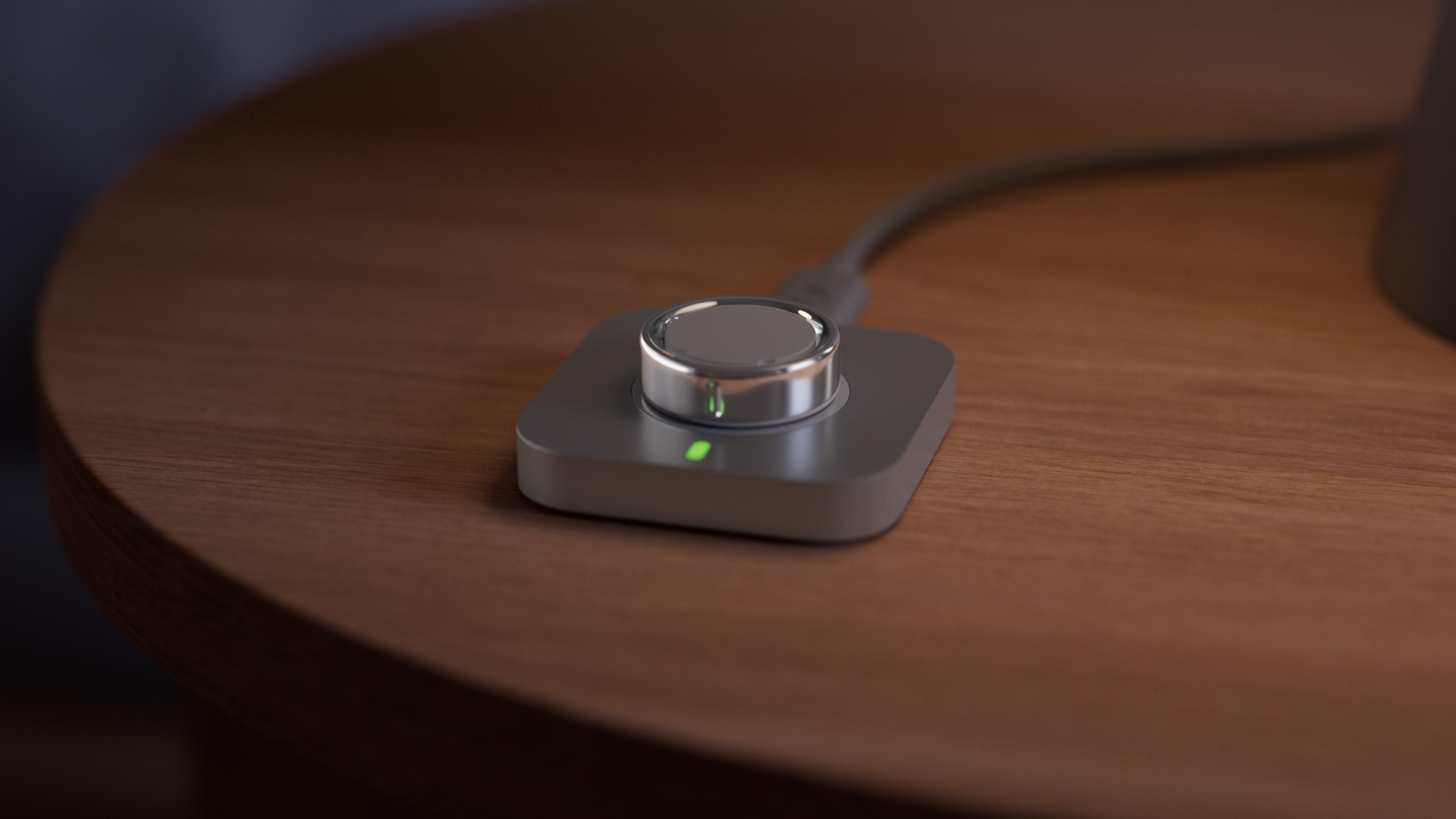 Oura Ring 4 on a charging puck