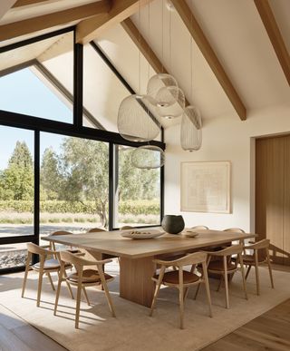 a large pitched dining room with a large dining table