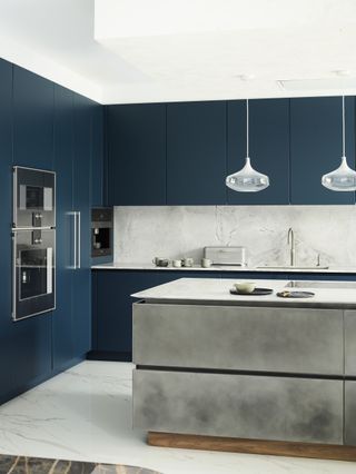 blue modern kitchen with kitchen corner appliances white splash back and kitchen island