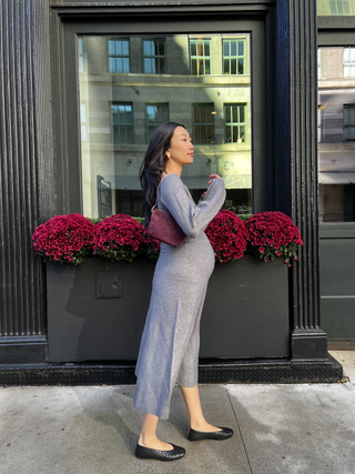 Yuri Mori wearing a grey dress and ballet flats