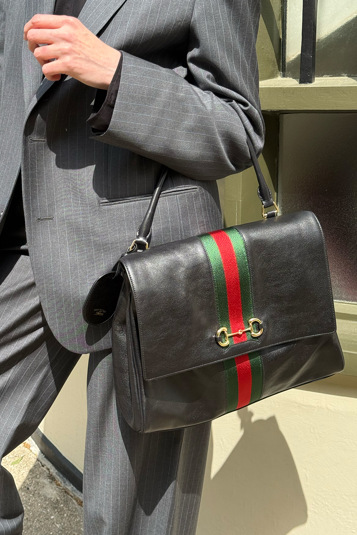Jane McFarland carrying the Gucci Paparazzo bag