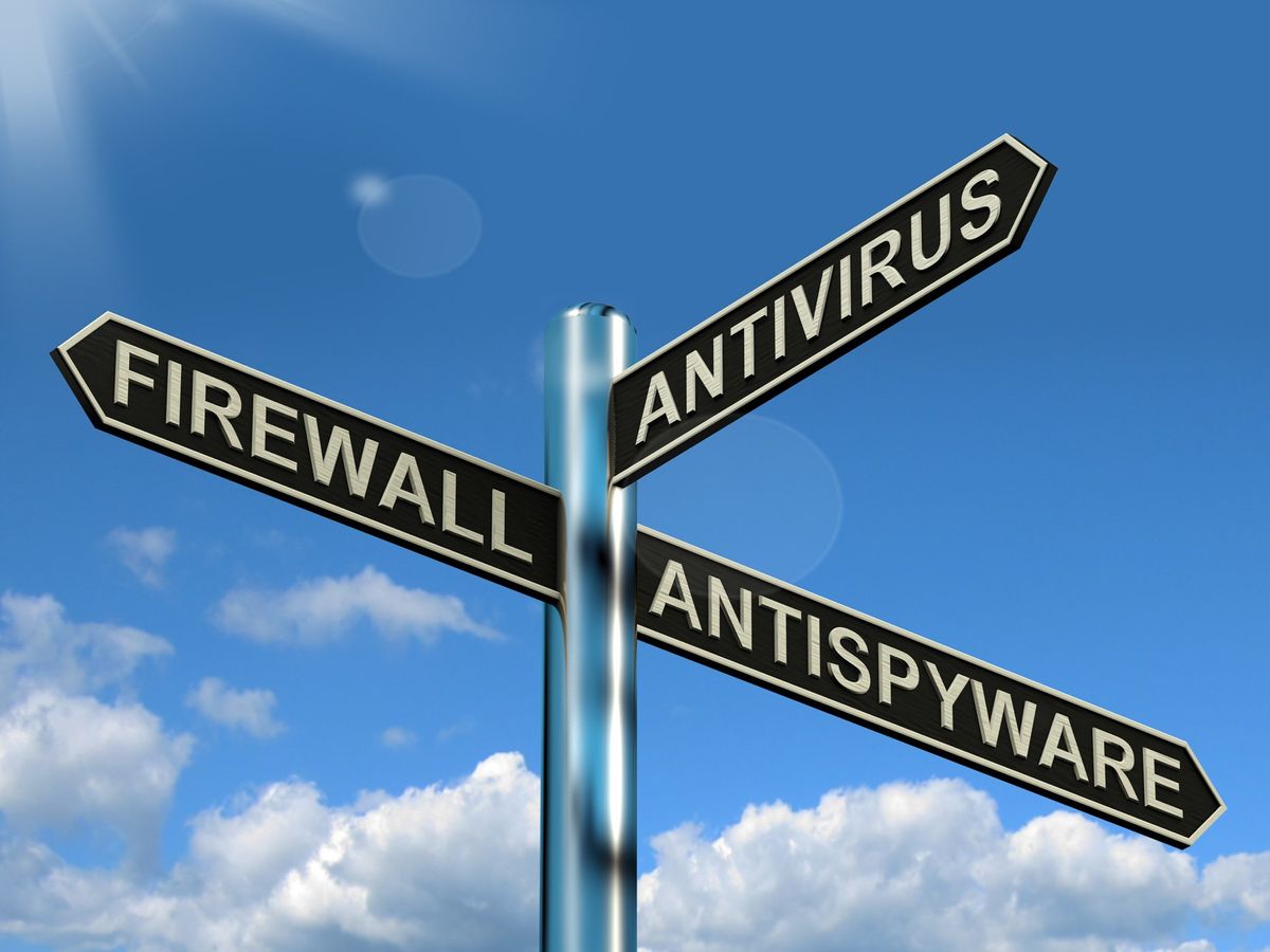 Stockvault Firewall Antivirus Antispyware Signpost Showing Internet And Computer