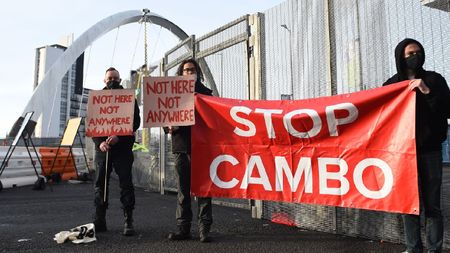 Activists holding sign reading 'Stop Cambo'